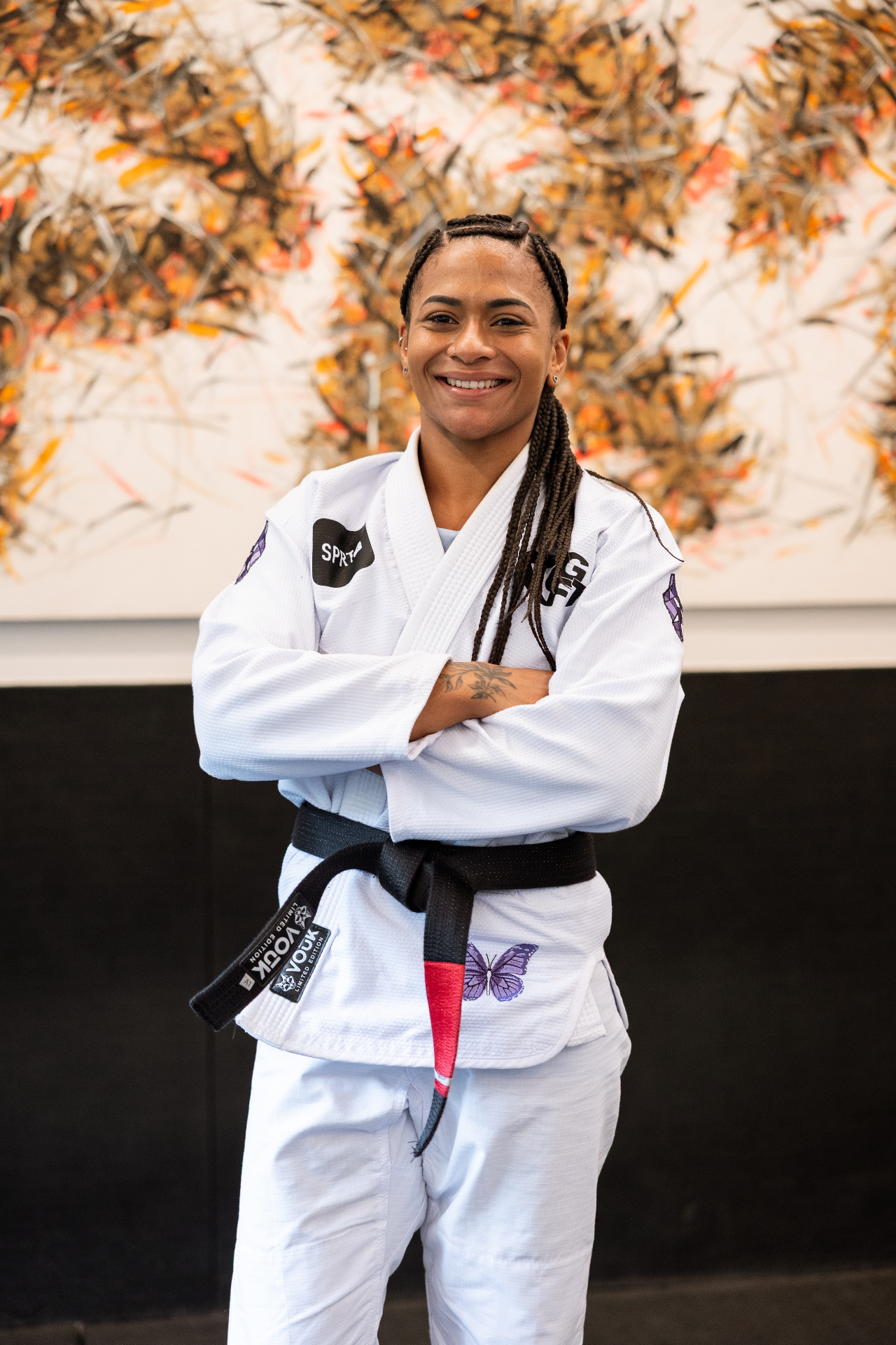 Vitória Vieira sorrindo, faixa-preta